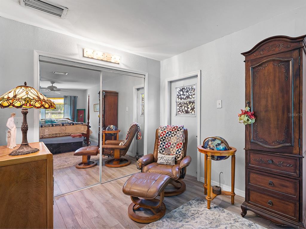 3932 Ragen Street North Port, FL 34287 - Photo 26 of 40 a view of a livingroom with furniture and workspace