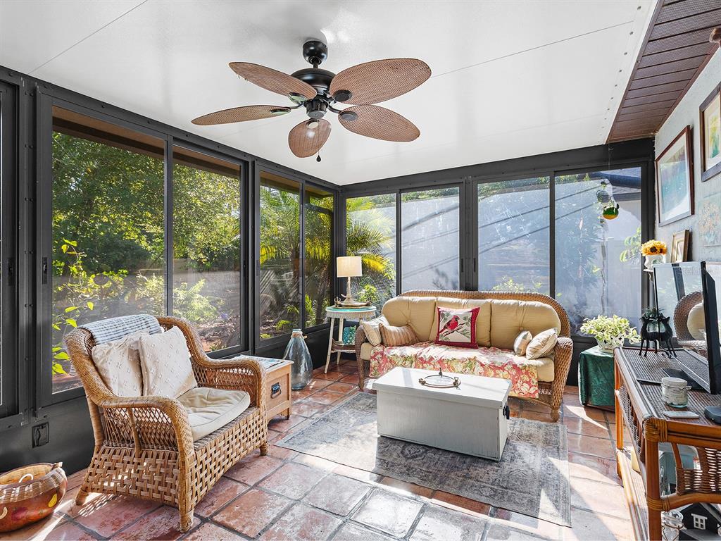 3932 Ragen Street North Port, FL 34287 - Photo 28 of 40 a living room with furniture and a large window