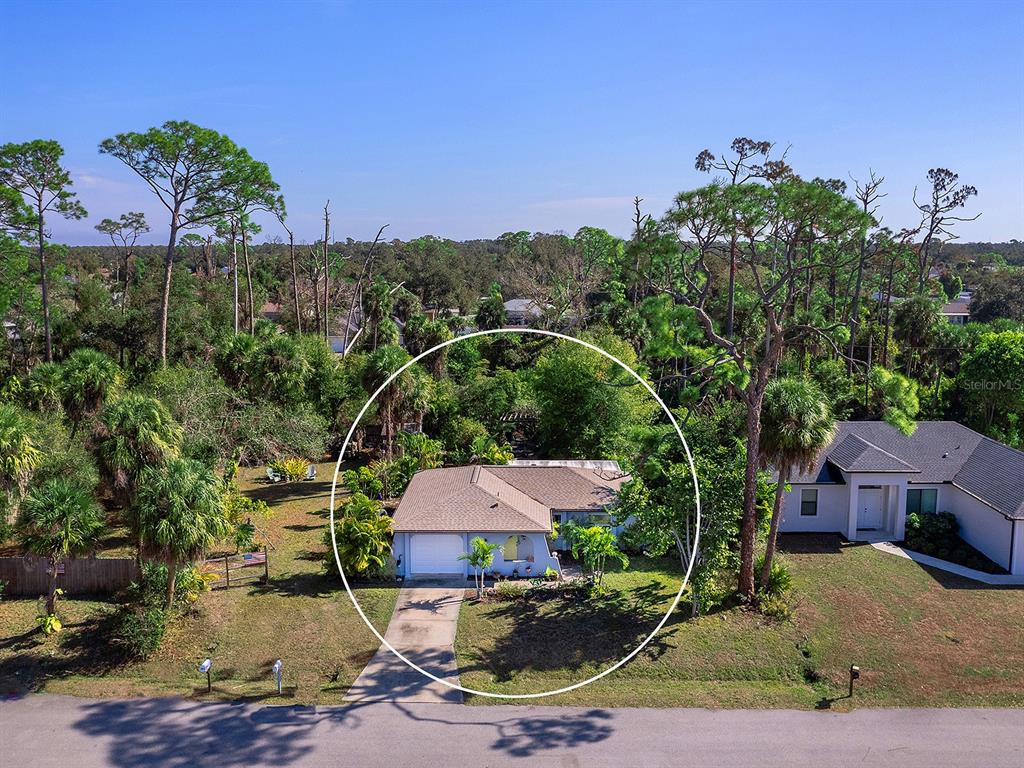 3932 Ragen Street North Port, FL 34287 - Photo 3 of 40 an aerial view of a house with outdoor space