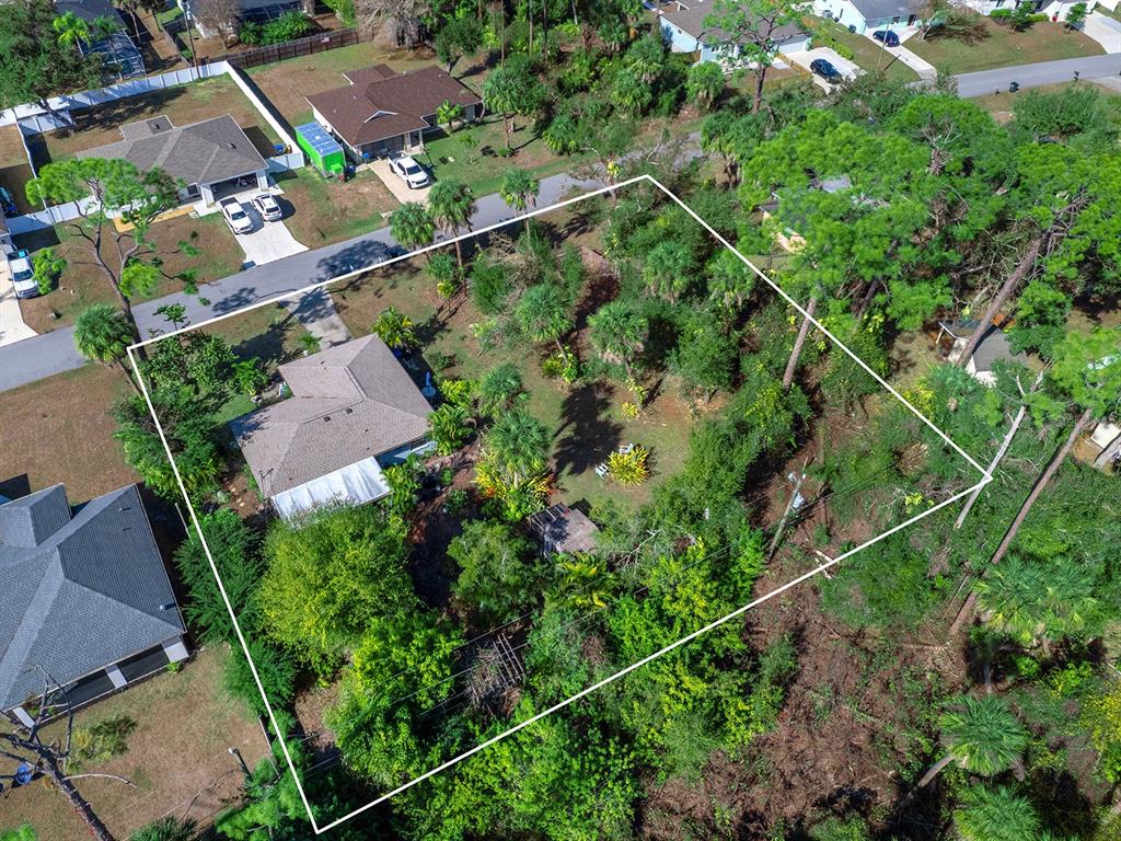 3932 Ragen Street North Port, FL 34287 - Photo 7 of 40 an aerial view of houses with yard