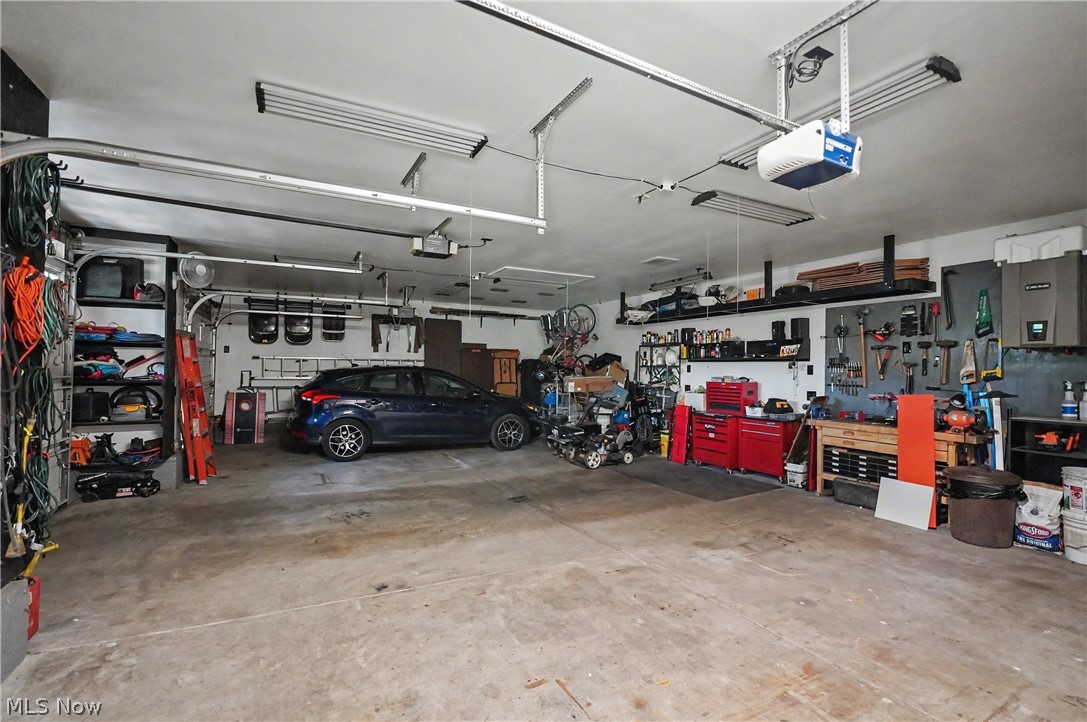 543 Fouse Avenue Akron, OH 44310 - Photo 7 of 50 View of the interior of heated garage which has heated floors that just need hooked up and pull down loft storage.