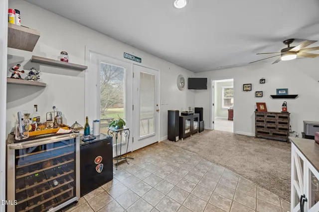 a view of a livingroom with furniture and toys