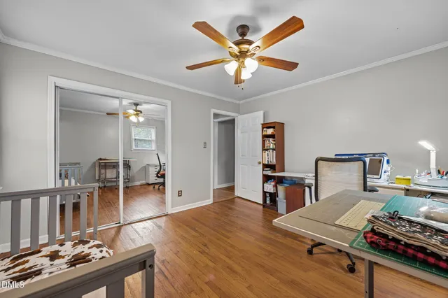 a workspace with furniture and wooden floor