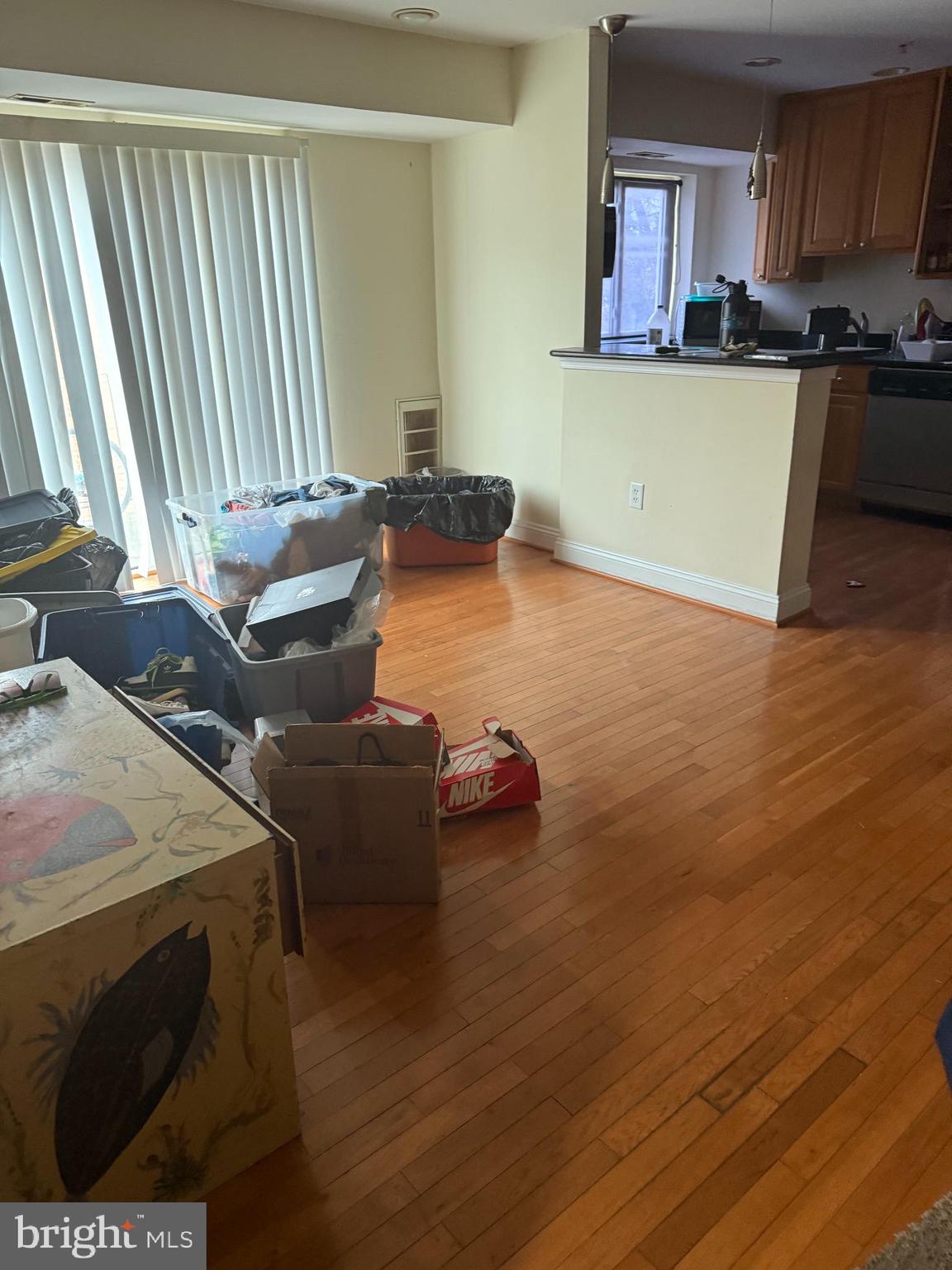 2215 Hunter Place Southeast, Unit 303 Washington, DC 20020 - Photo 3 of 4 a kitchen with a sink and a stove top oven