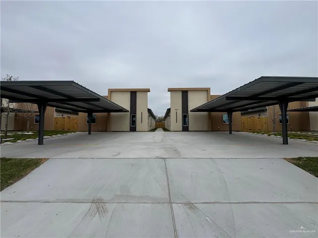 a view of house with outdoor space and sitting area