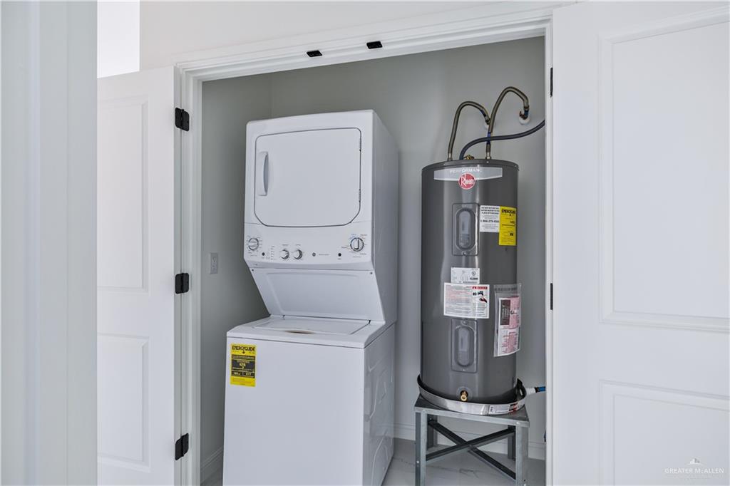 5322 Vision Street Rio Grande City, TX 78582 - Photo 14 of 19 a utility room with dryer and washer