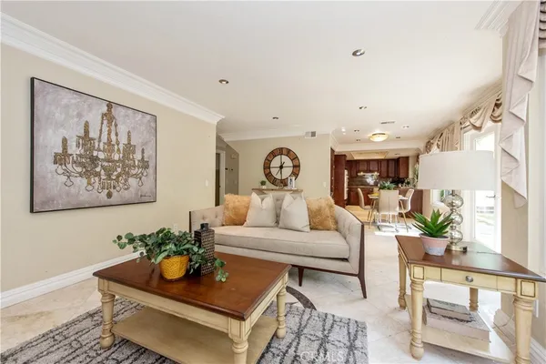 a living room with furniture and rug