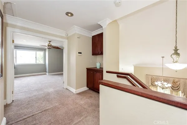 a view of a kitchen cabinets and a kitchen counter top space