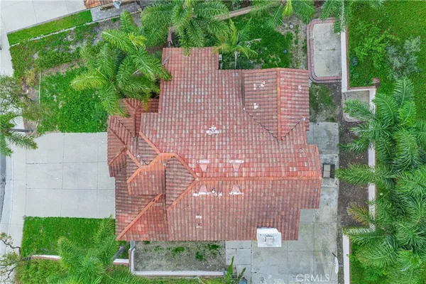 an aerial view of a house with a garden