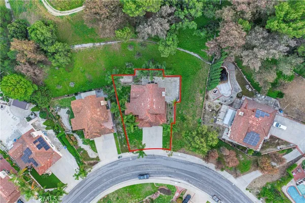 a view of a house with a street