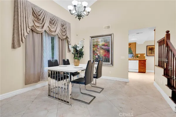 a view of a dining room with furniture