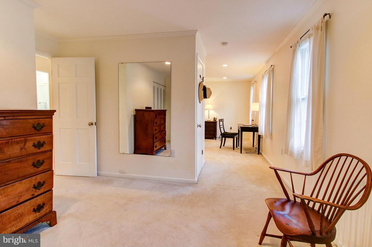 11419 Running Cedar Road Reston, VA 20191 - Photo 15 of 30 a view of an entryway with a table and chairs
