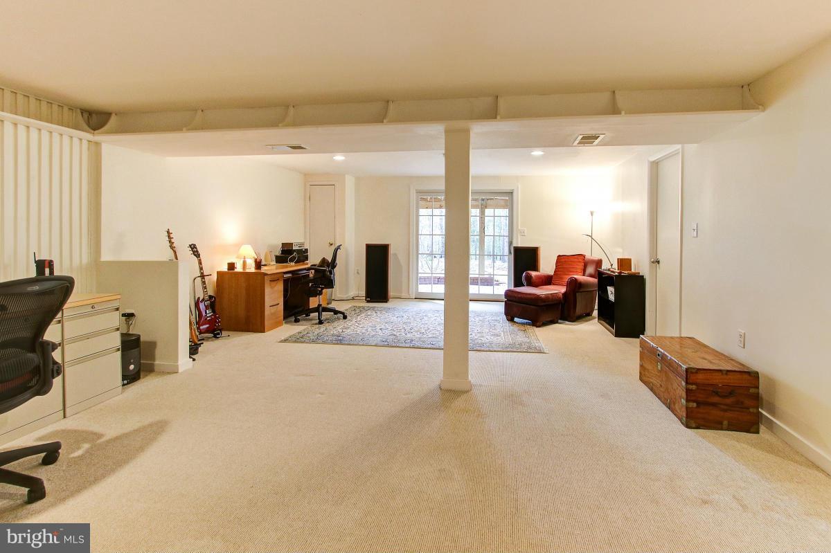 11419 Running Cedar Road Reston, VA 20191 - Photo 23 of 30 a view of a livingroom with furniture and a large window
