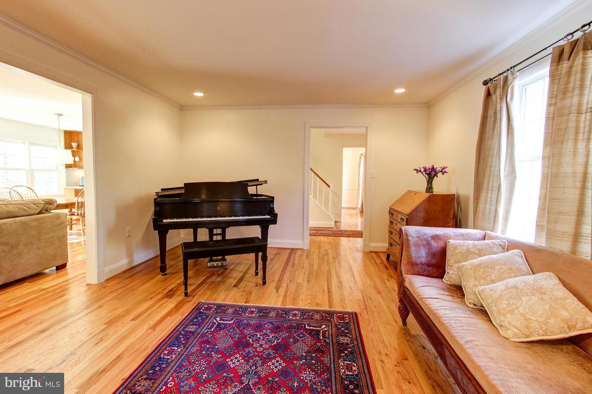 11419 Running Cedar Road Reston, VA 20191 - Photo 4 of 30 a living room with furniture and a wooden floor