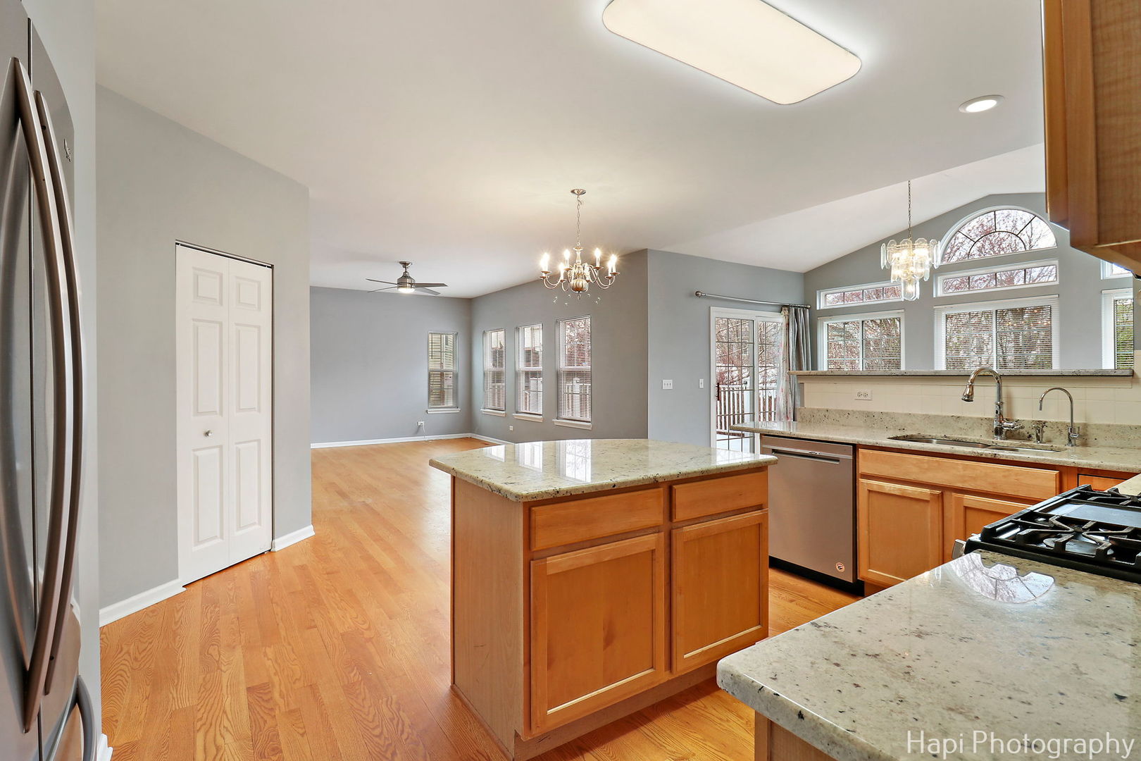 123 Norman Drive McHenry, IL 60050 - Photo 11 of 33 a large kitchen with kitchen island a sink stainless steel appliances and cabinets