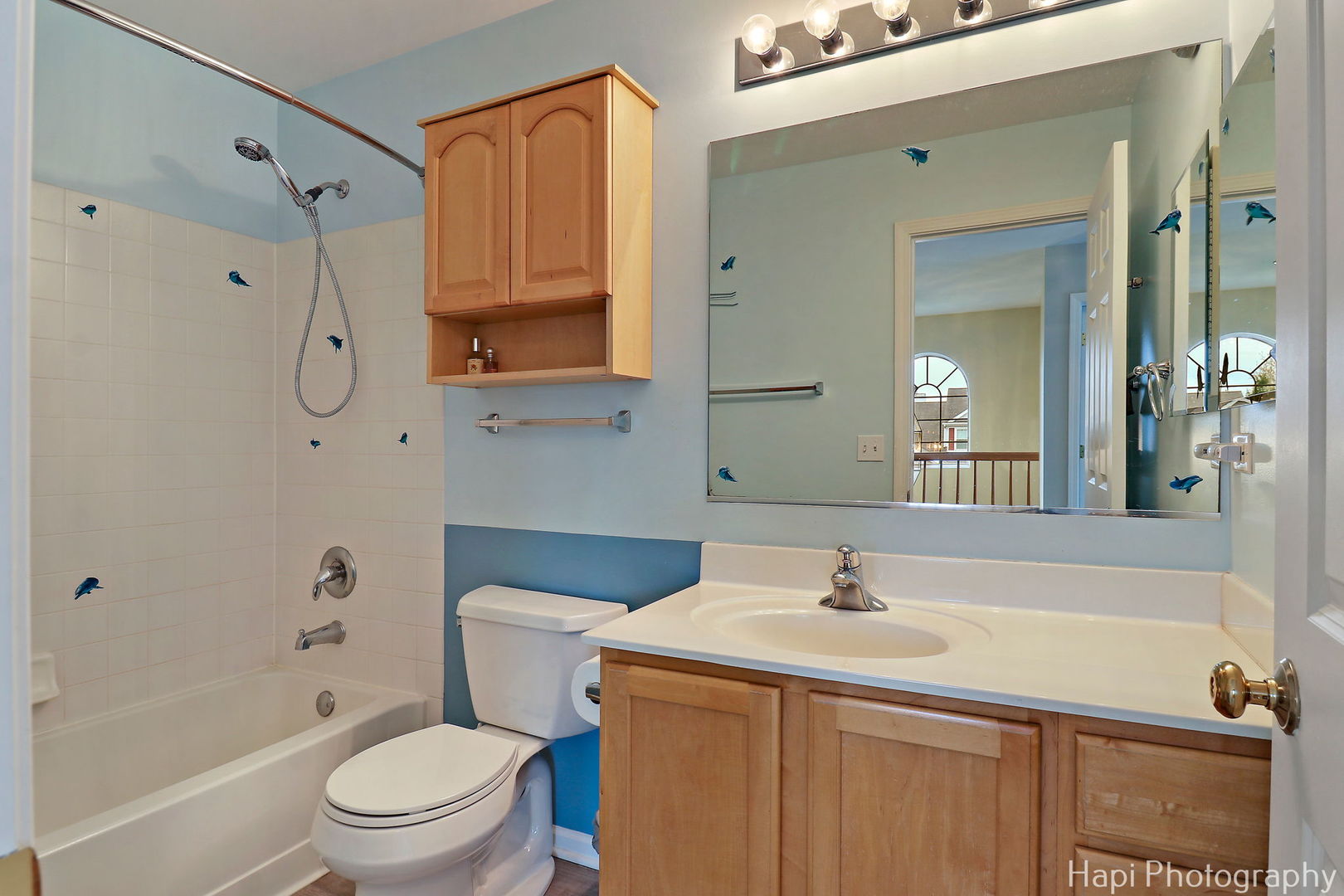 123 Norman Drive McHenry, IL 60050 - Photo 21 of 33 a bathroom with a sink a toilet and shower
