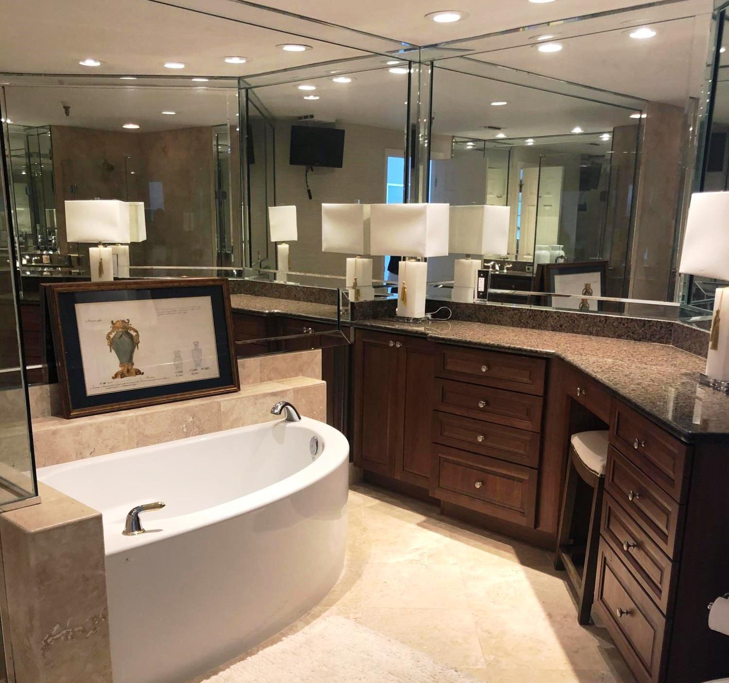 320 Harbor Boulevard, Unit 502 Destin, FL 32541 - Photo 13 of 22 a large kitchen with a large counter top and stainless steel appliances