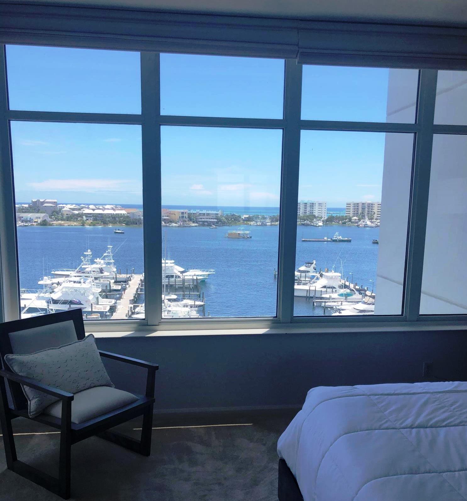 320 Harbor Boulevard, Unit 502 Destin, FL 32541 - Photo 16 of 22 a room with a large window