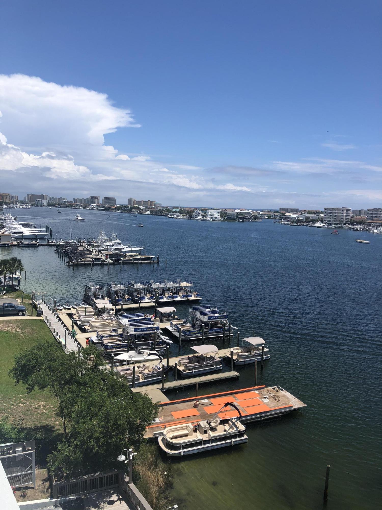 320 Harbor Boulevard, Unit 502 Destin, FL 32541 - Photo 20 of 22 an aerial view of a house with lake view