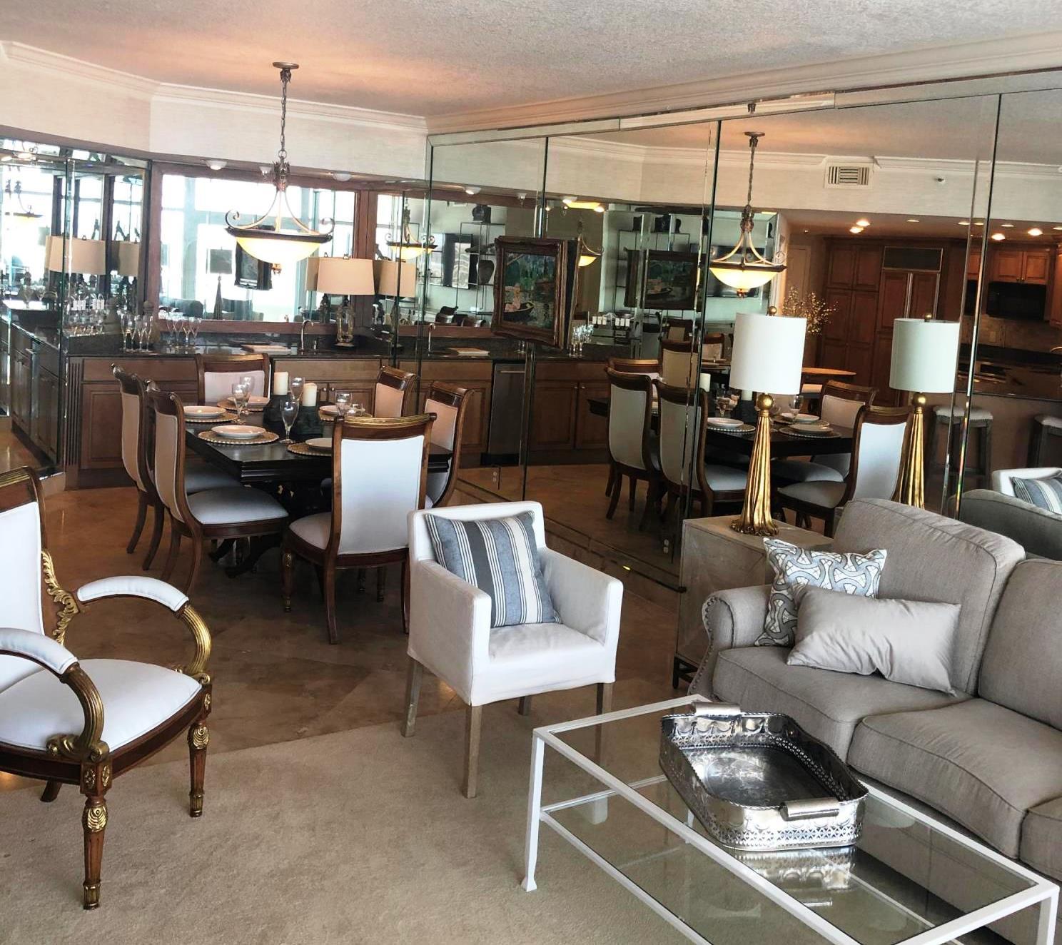 320 Harbor Boulevard, Unit 502 Destin, FL 32541 - Photo 2 of 22 a living room with lots of furniture and appliances