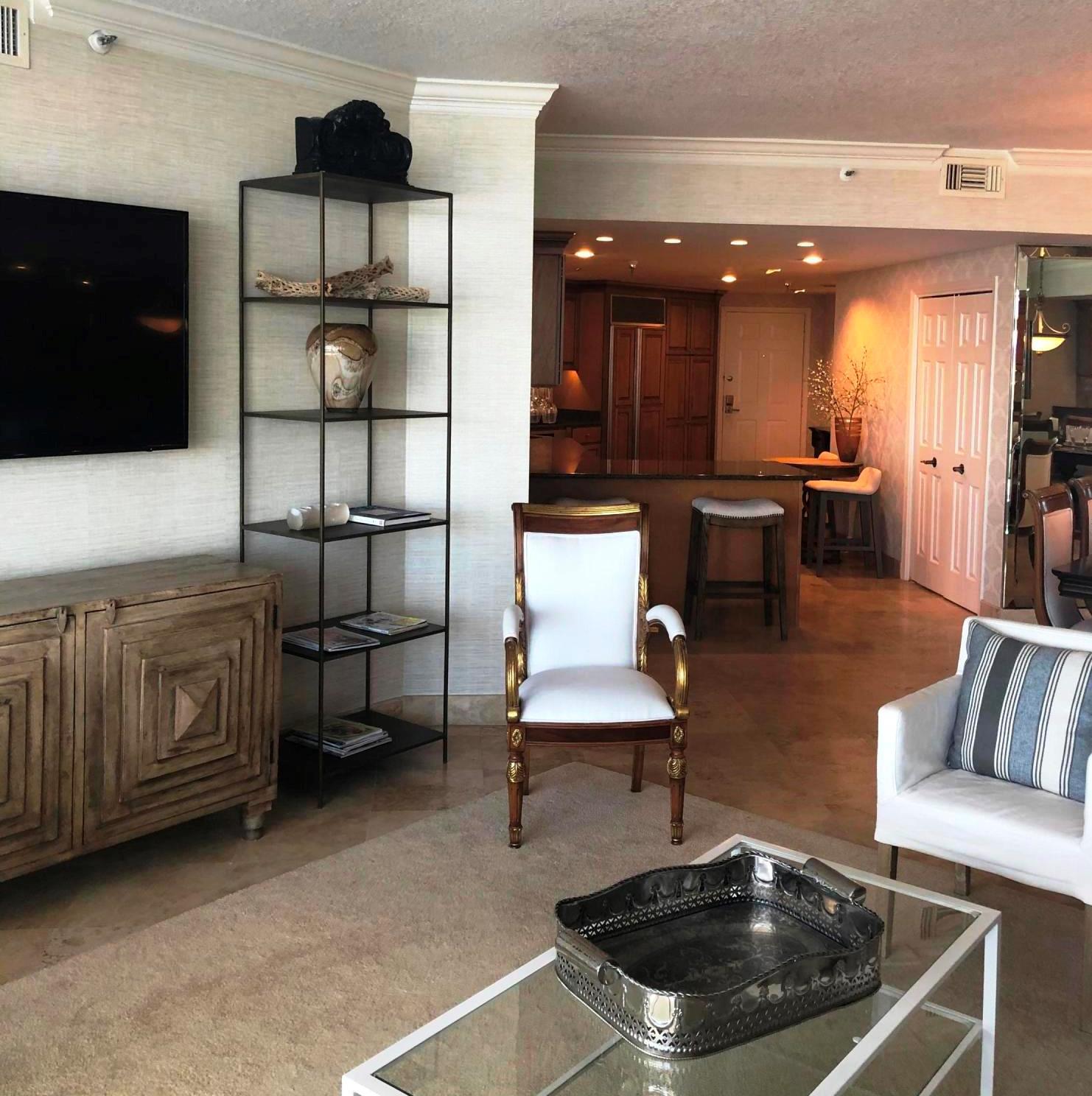 320 Harbor Boulevard, Unit 502 Destin, FL 32541 - Photo 3 of 22 a living room with furniture and a flat screen tv