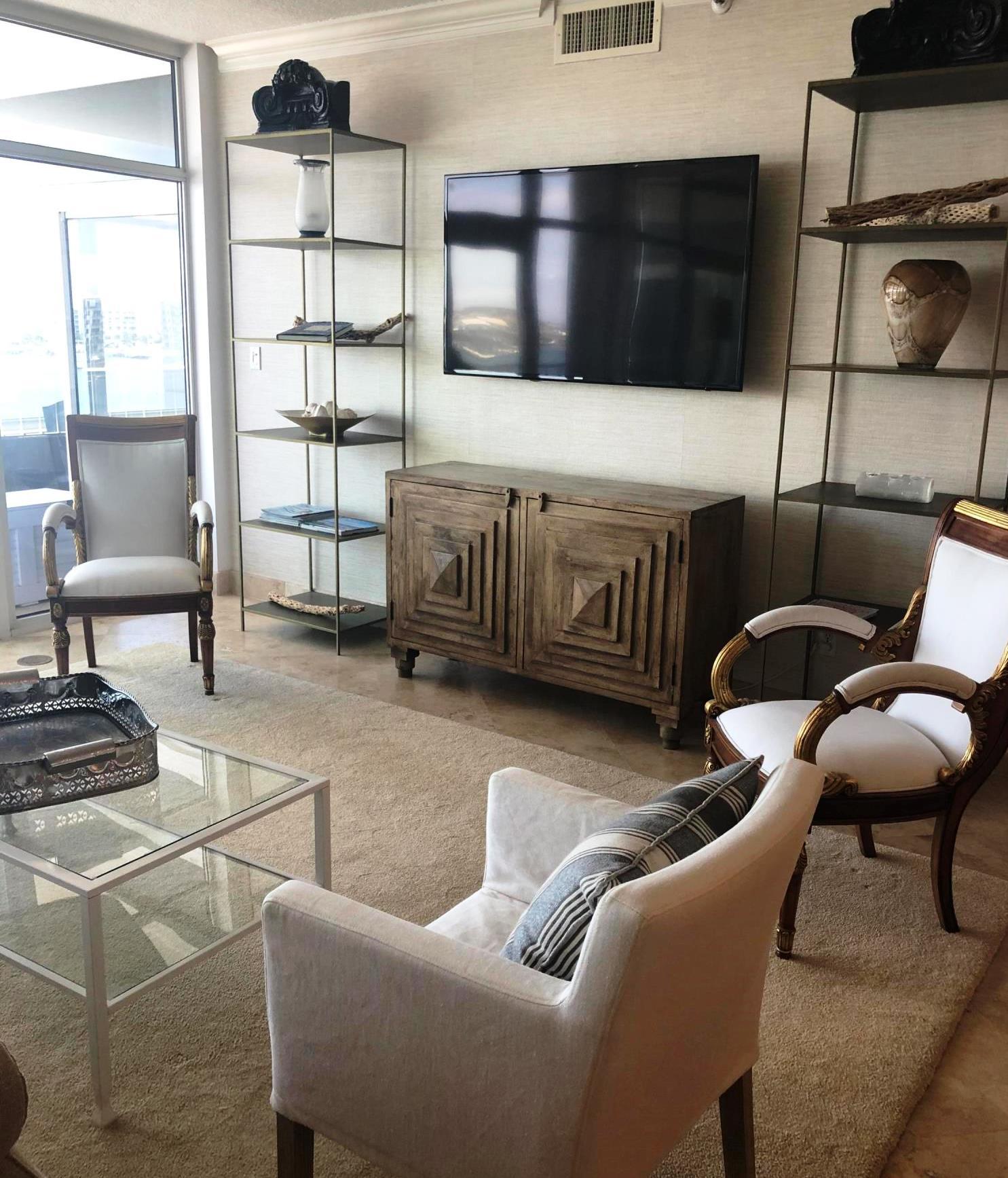 320 Harbor Boulevard, Unit 502 Destin, FL 32541 - Photo 5 of 22 a living room with furniture and a flat screen tv