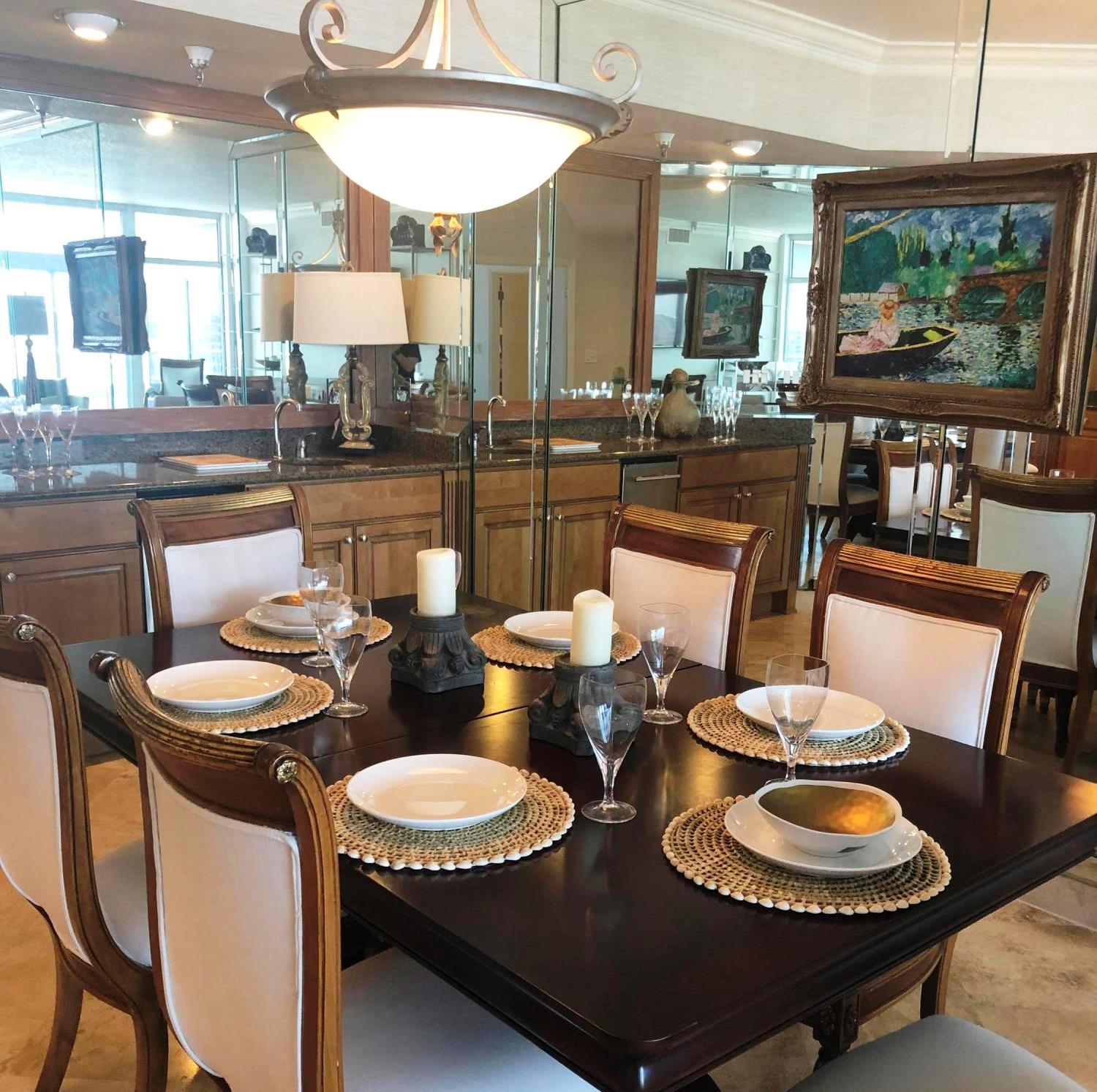 320 Harbor Boulevard, Unit 502 Destin, FL 32541 - Photo 6 of 22 a dining room with furniture and a floor to ceiling window