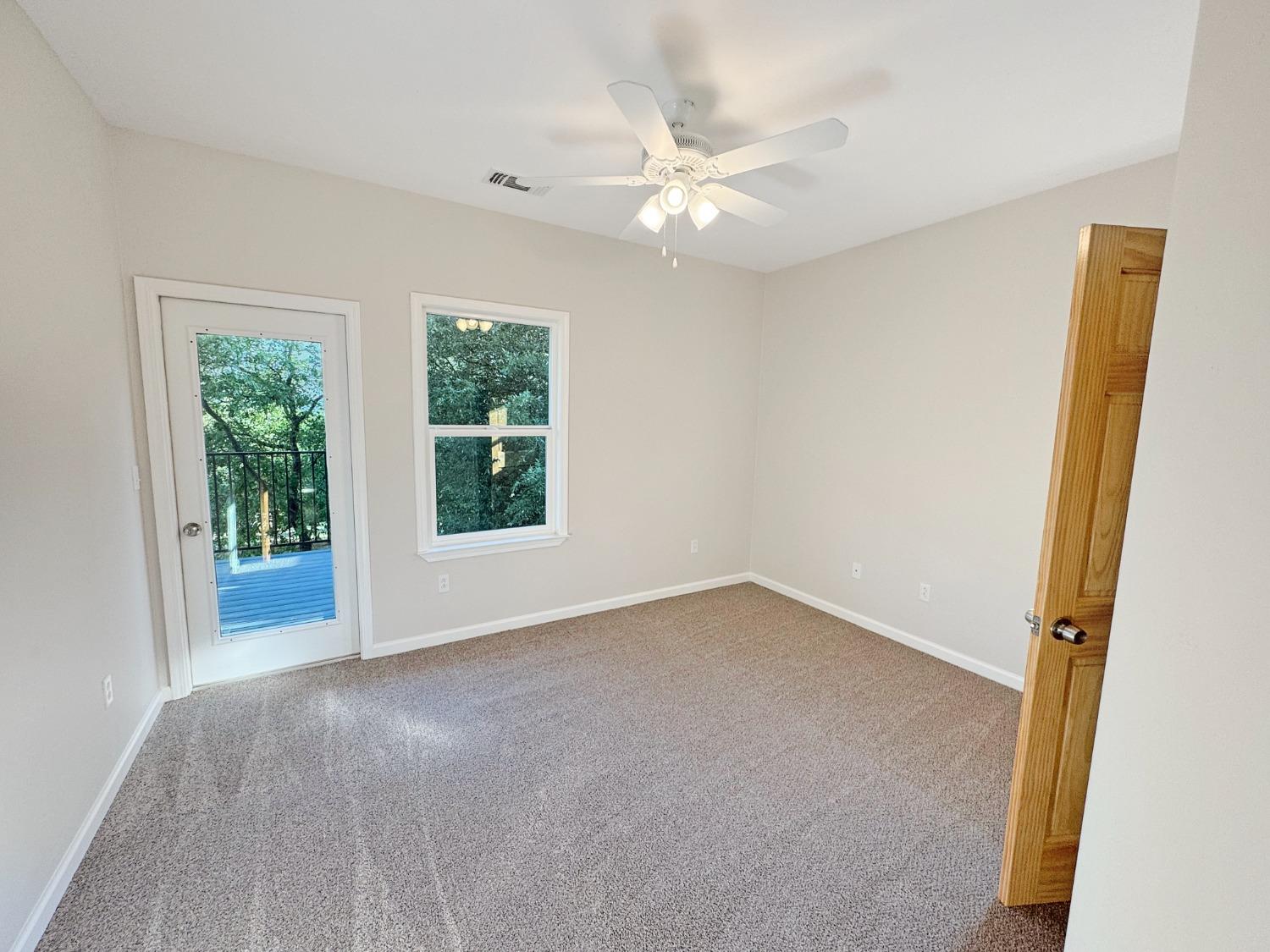 10095 Birchville Road Nevada City, CA 95959 - Photo 18 of 38 a view of an empty room with a window