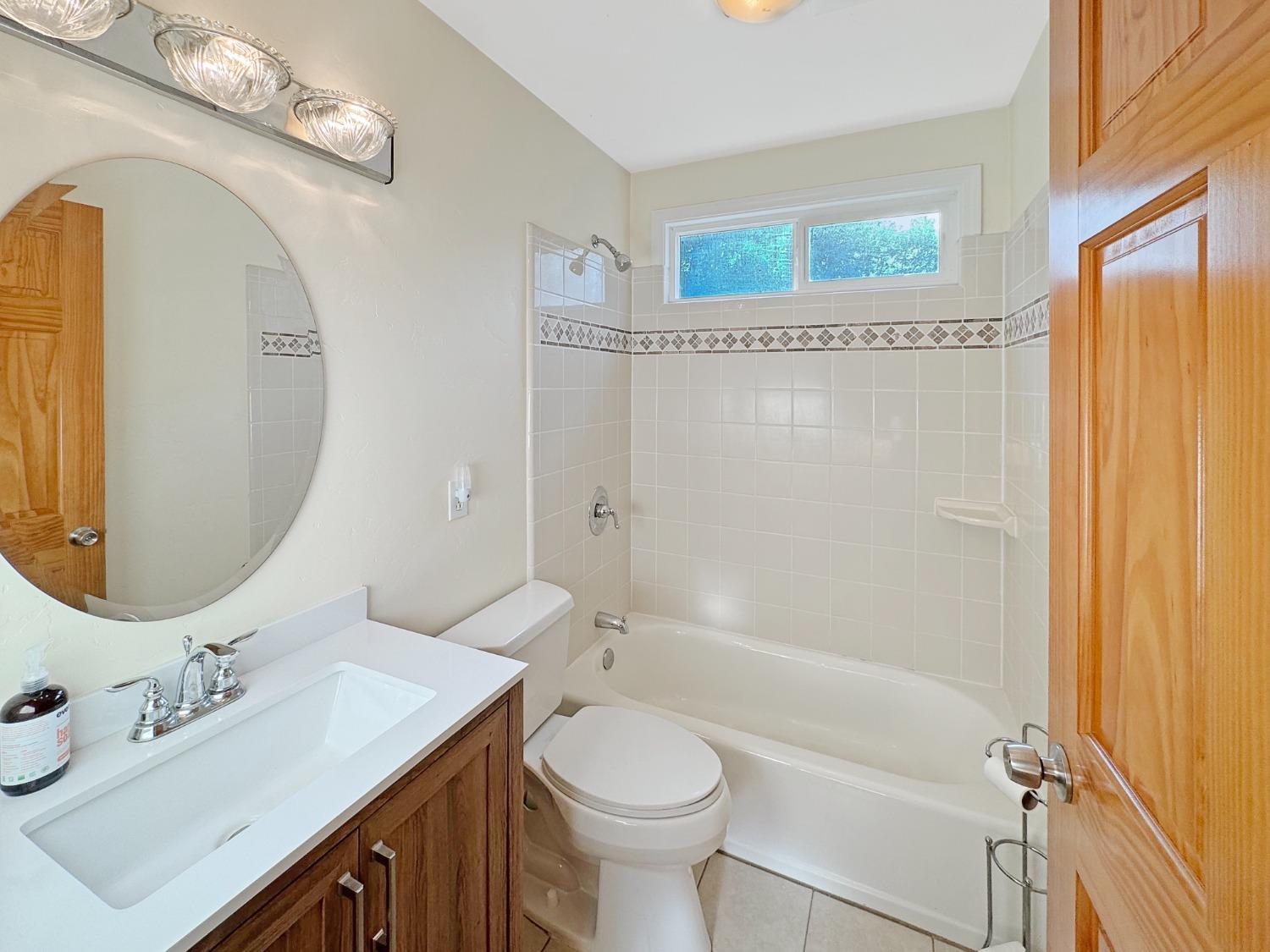 10095 Birchville Road Nevada City, CA 95959 - Photo 21 of 38 a bathroom with a sink toilet and shower