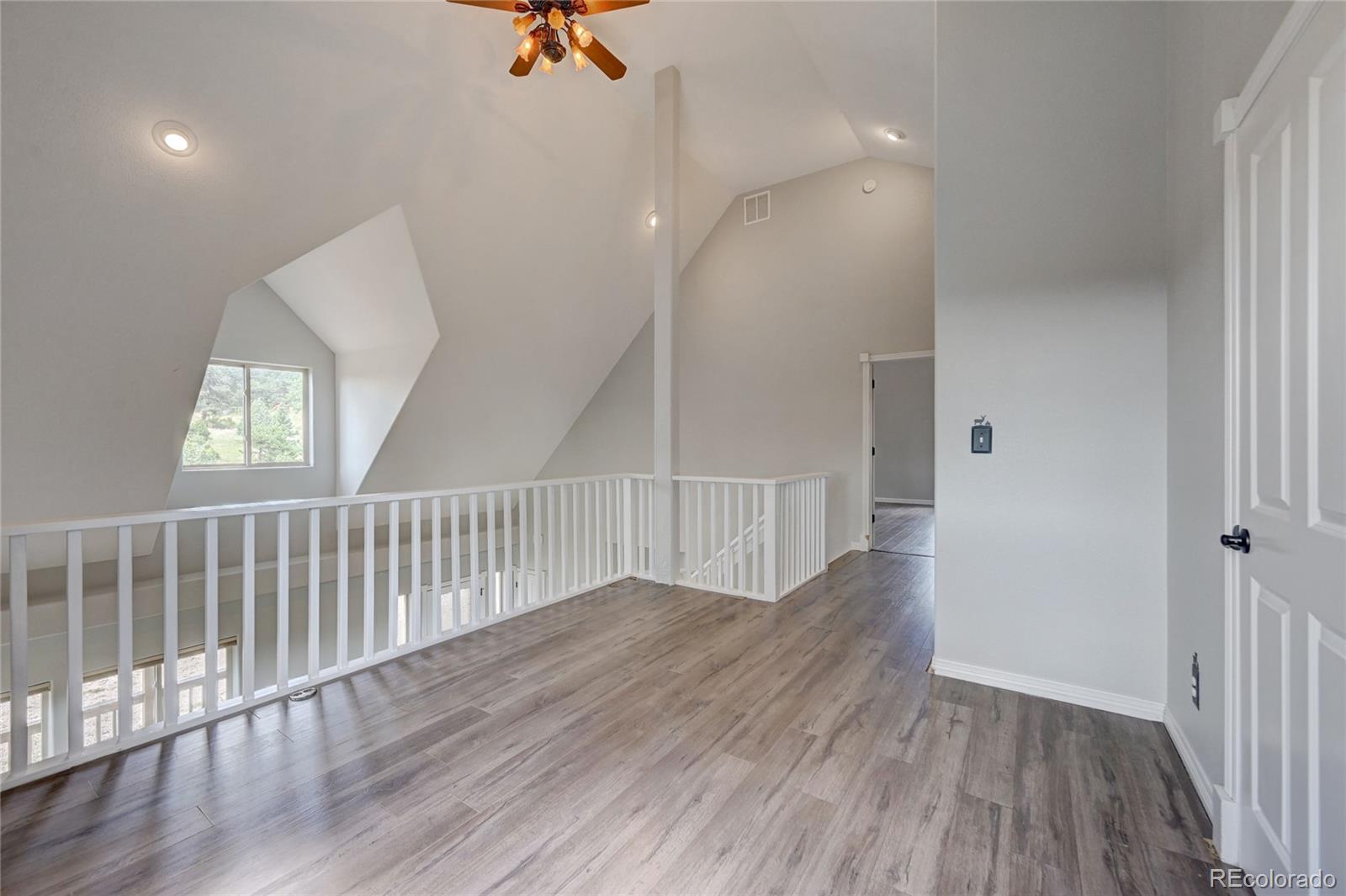 13093 Lori Drive Conifer, CO 80433 - Photo 12 of 36 a view of entryway with wooden floor