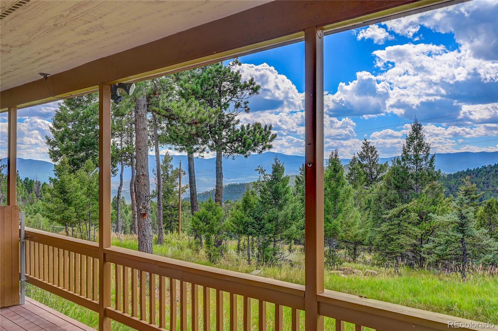 13093 Lori Drive Conifer, CO 80433 - Photo 19 of 36 a view of a porch