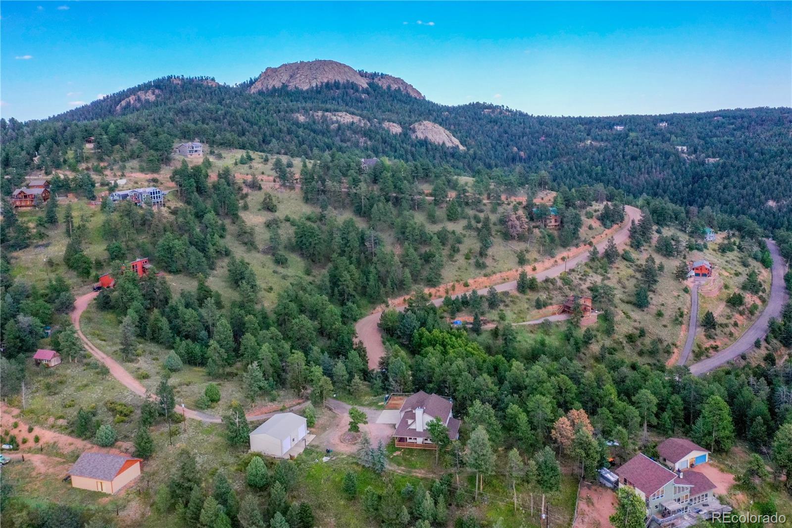 13093 Lori Drive Conifer, CO 80433 - Photo 30 of 36 an aerial view of residential house with an outdoor space and mountain view