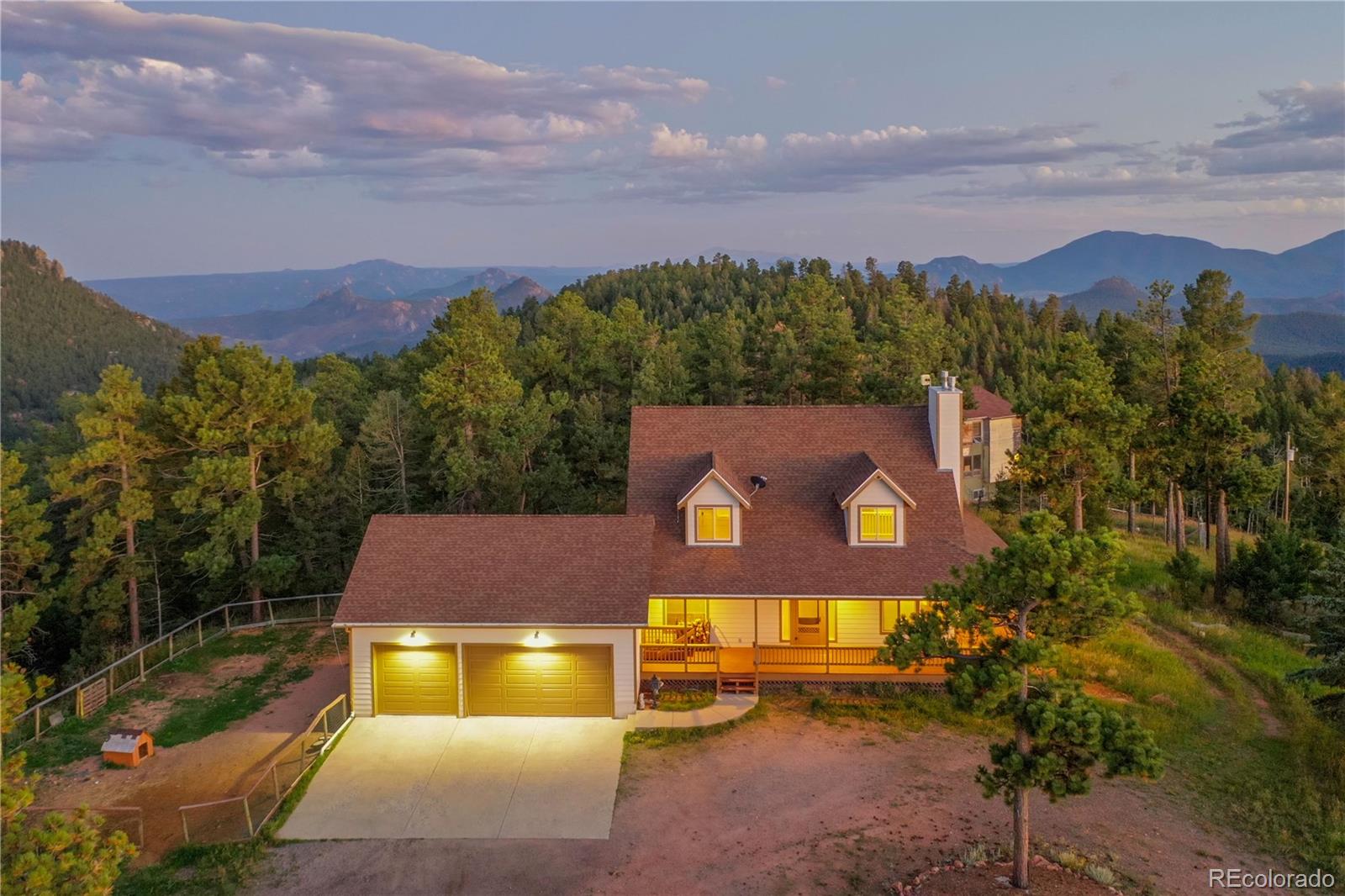 13093 Lori Drive Conifer, CO 80433 - Photo 32 of 36 a view of a city with a building in the background