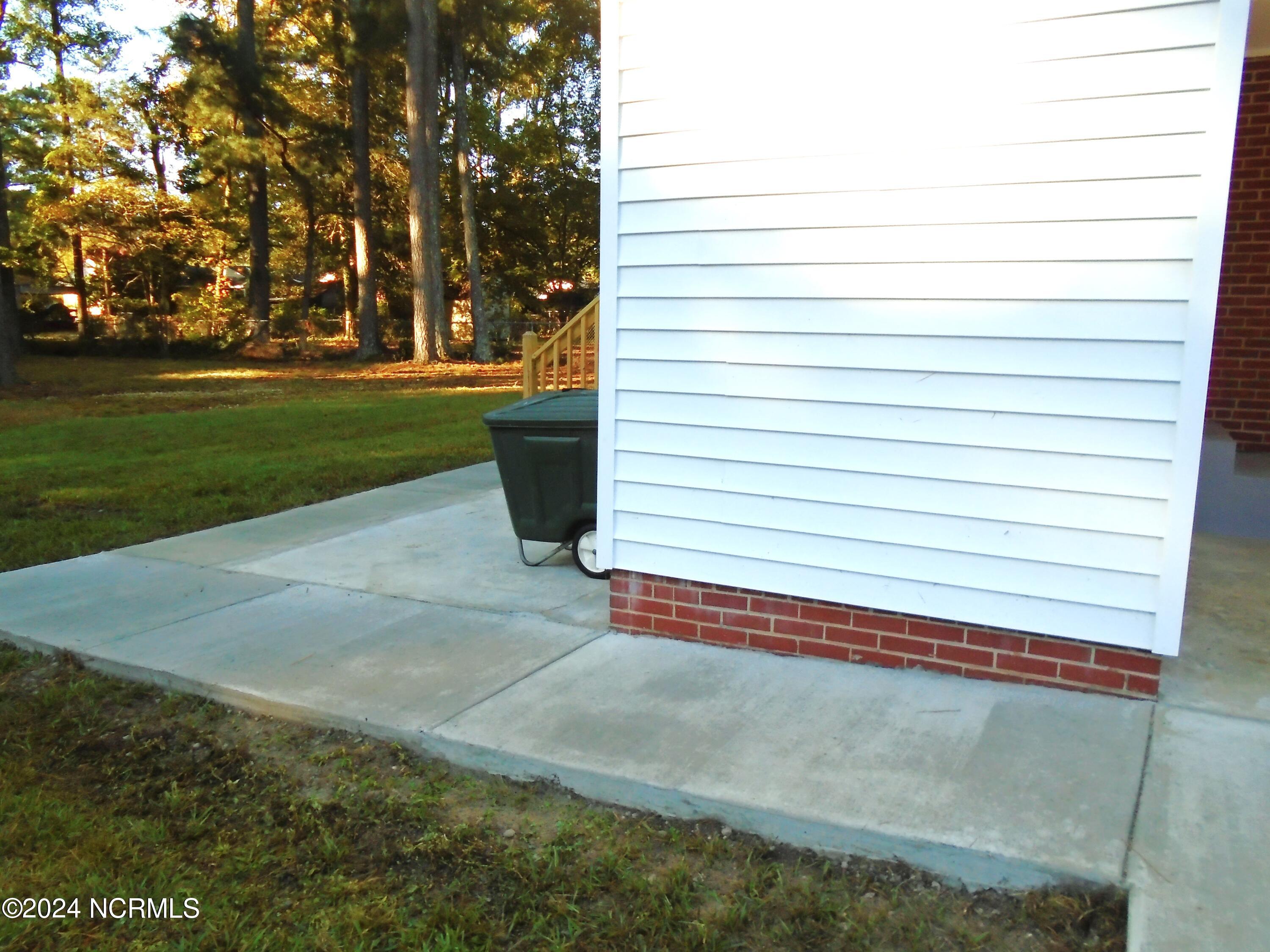 2825 Winstead Road Rocky Mount, NC 27804 - Photo 5 of 42 Walkway to patio