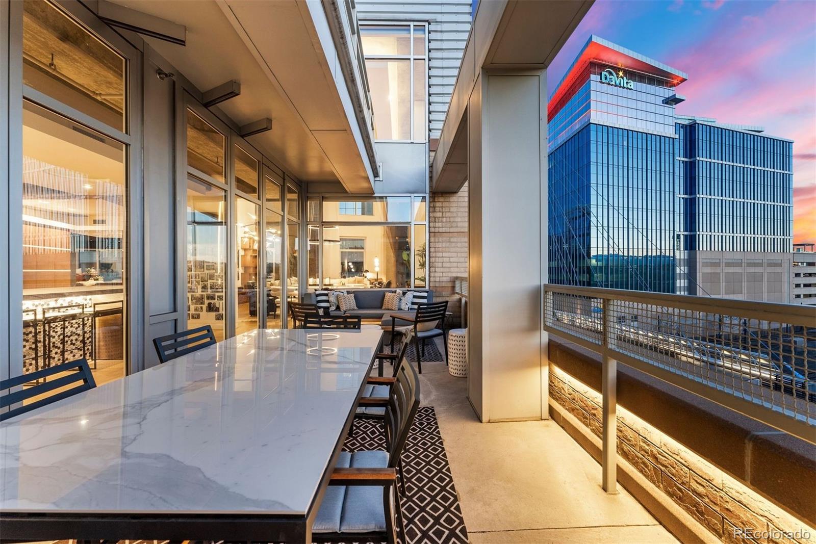 1610 Little Raven Street, Unit PH6 Denver, CO 80202 - Photo 14 of 41 a lobby with furniture and floor to ceiling window