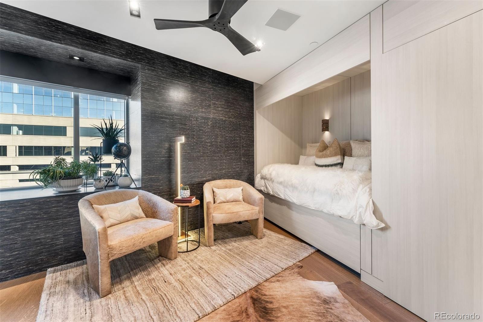 1610 Little Raven Street, Unit PH6 Denver, CO 80202 - Photo 17 of 41 a bedroom with furniture and a large window