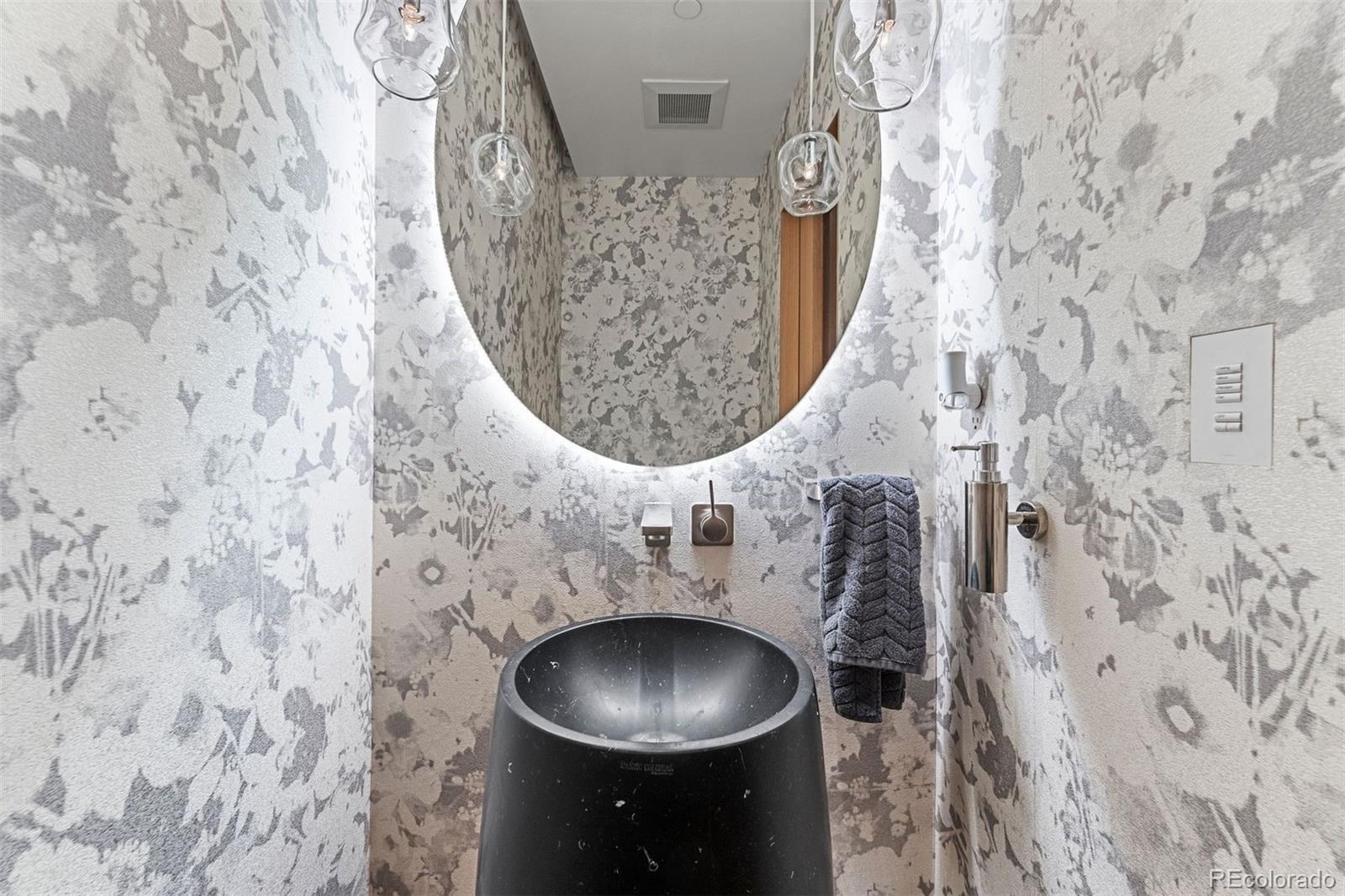 1610 Little Raven Street, Unit PH6 Denver, CO 80202 - Photo 18 of 41 a close view of a utility room with a brick wall