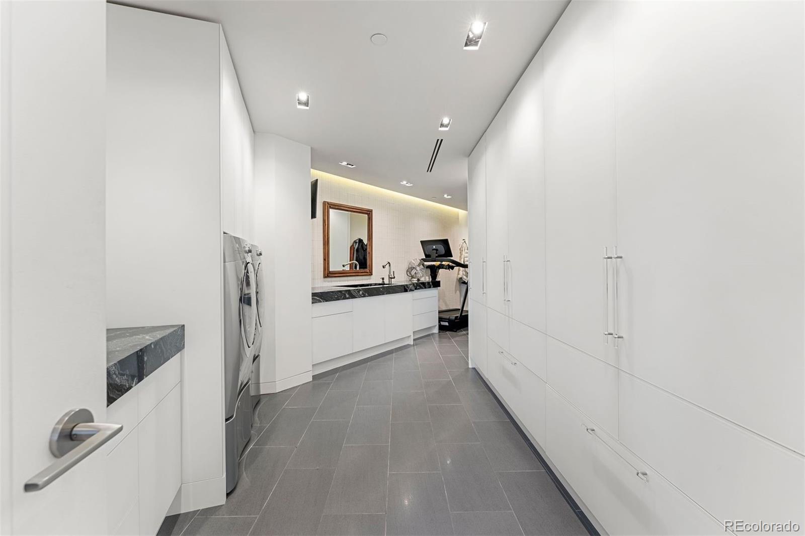 1610 Little Raven Street, Unit PH6 Denver, CO 80202 - Photo 19 of 41 a view of a kitchen with a sink