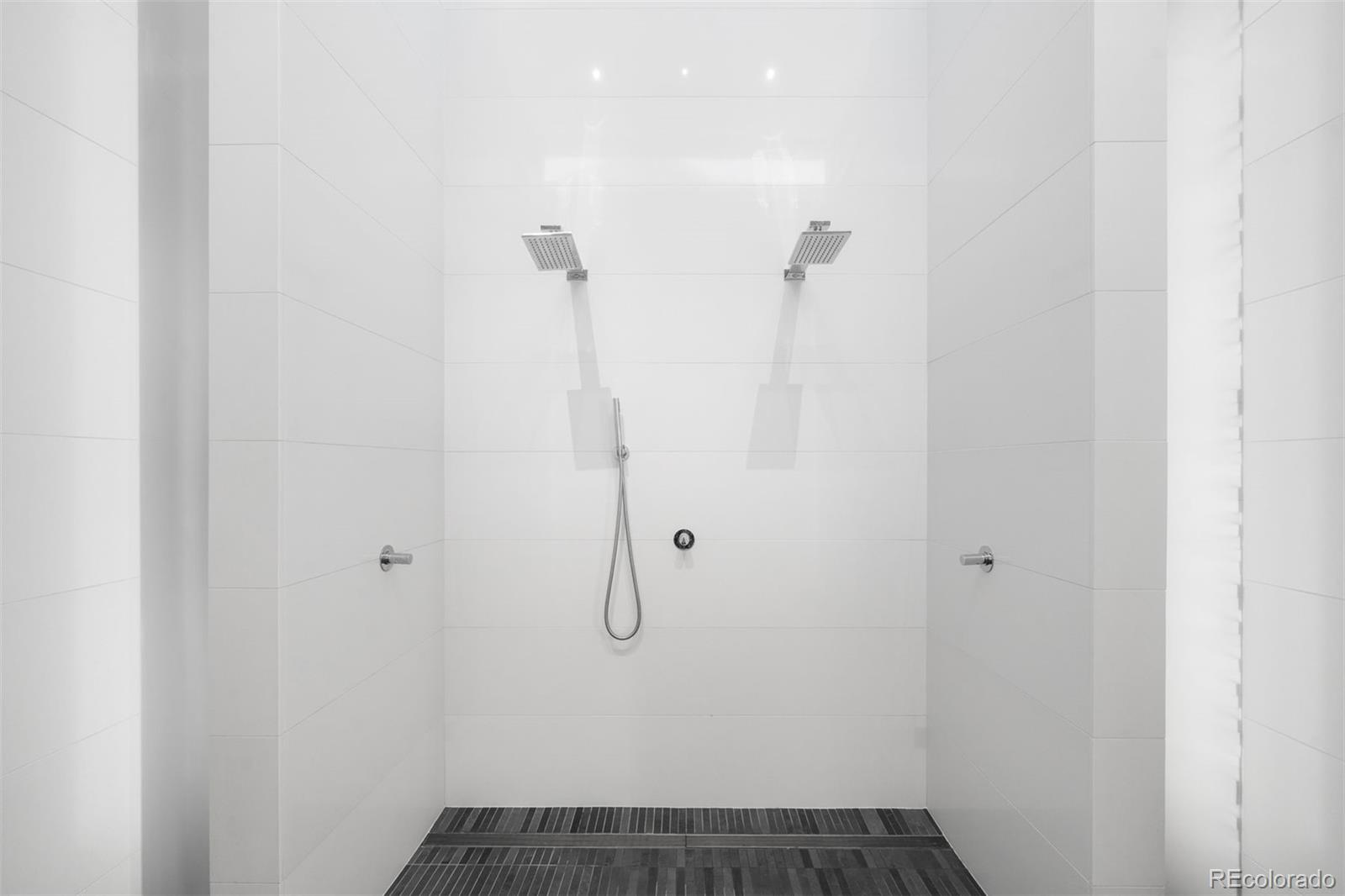 1610 Little Raven Street, Unit PH6 Denver, CO 80202 - Photo 30 of 41 a bathroom with a shower