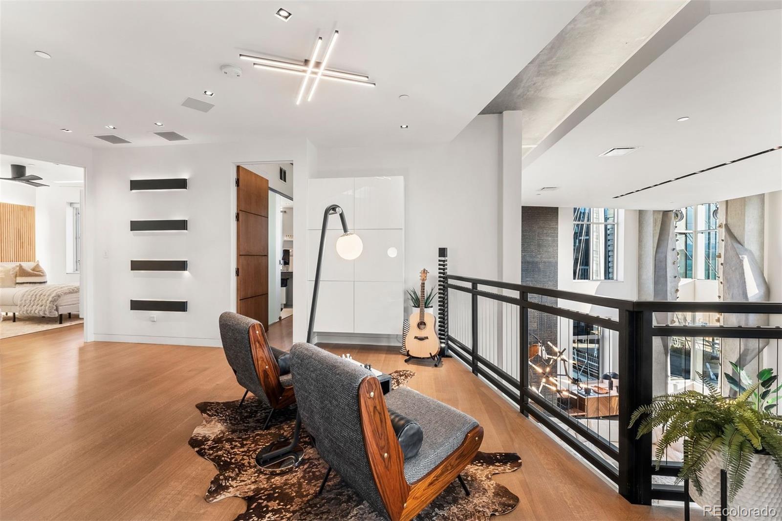 1610 Little Raven Street, Unit PH6 Denver, CO 80202 - Photo 33 of 41 a living room with furniture
