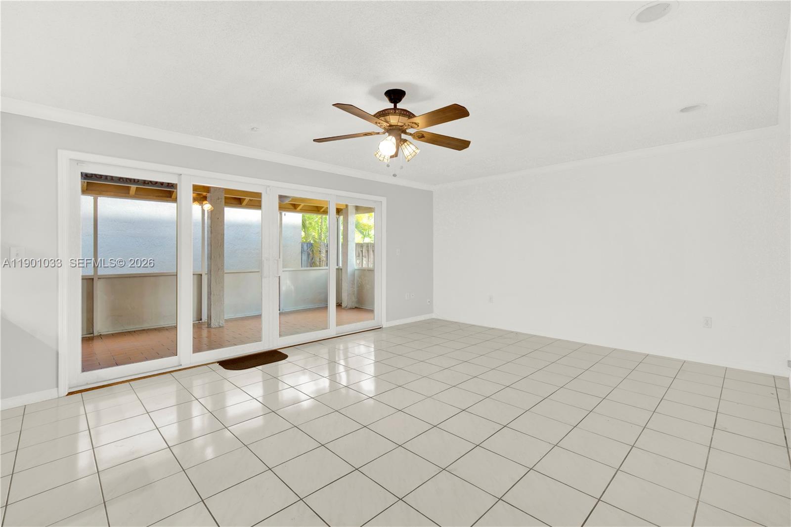 10825 Southwest 91st Lane Miami, FL 33176 - Photo 11 of 52 a view of an empty room with a window