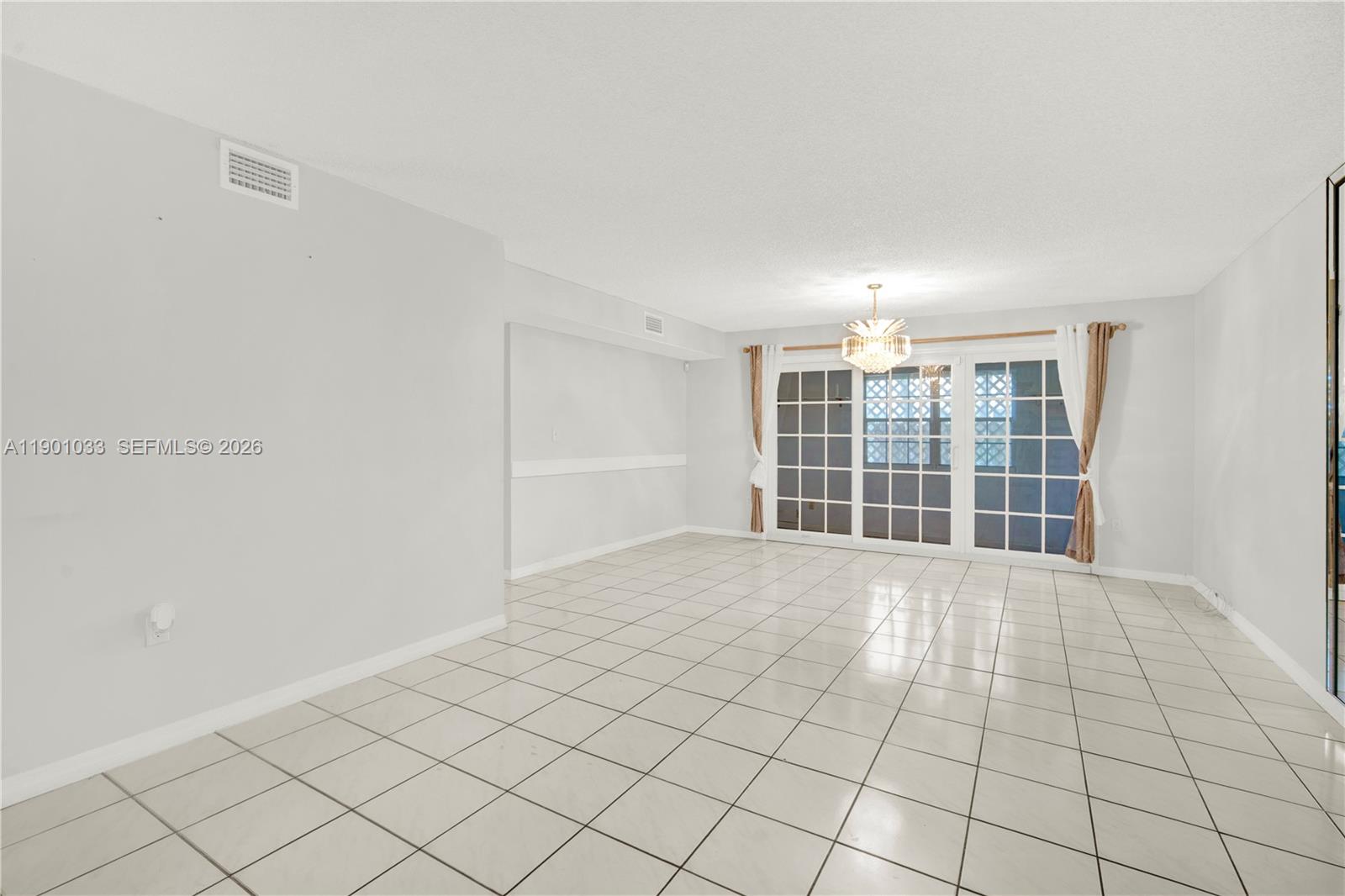 10825 Southwest 91st Lane Miami, FL 33176 - Photo 15 of 52 a view of an empty room with a window