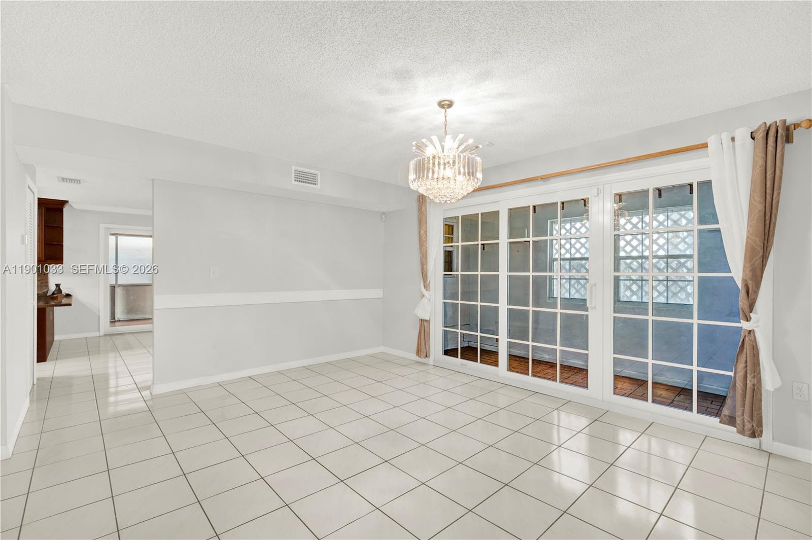 10825 Southwest 91st Lane Miami, FL 33176 - Photo 16 of 52 a view of empty room with wooden floor