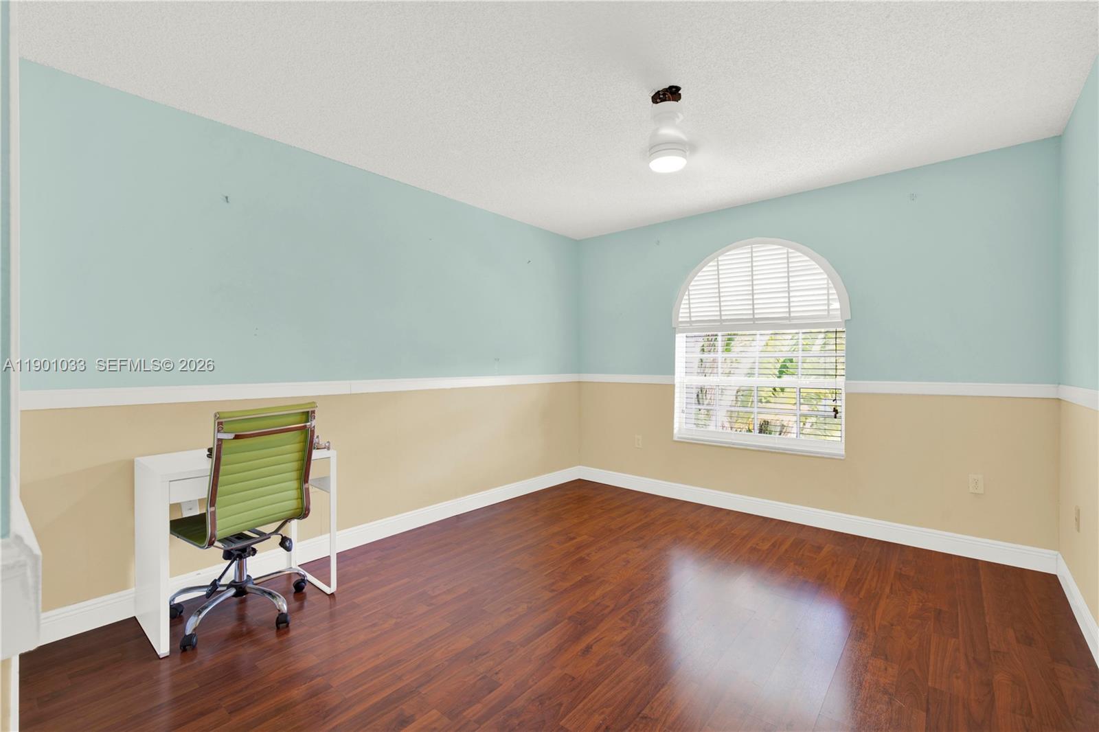 10825 Southwest 91st Lane Miami, FL 33176 - Photo 31 of 52 a view of a room with wooden floor and windows
