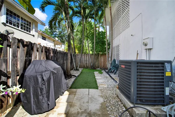 a view of a back yard of the house
