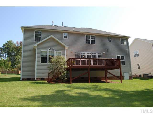 9219 Stone Mountain Road Raleigh, NC 27613 - Photo 20 of 25 Entertaining family and friends is easy on the spacious back deck. Patio/Deck