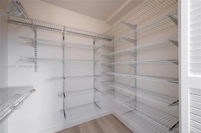 a view of a room with racks on the wall