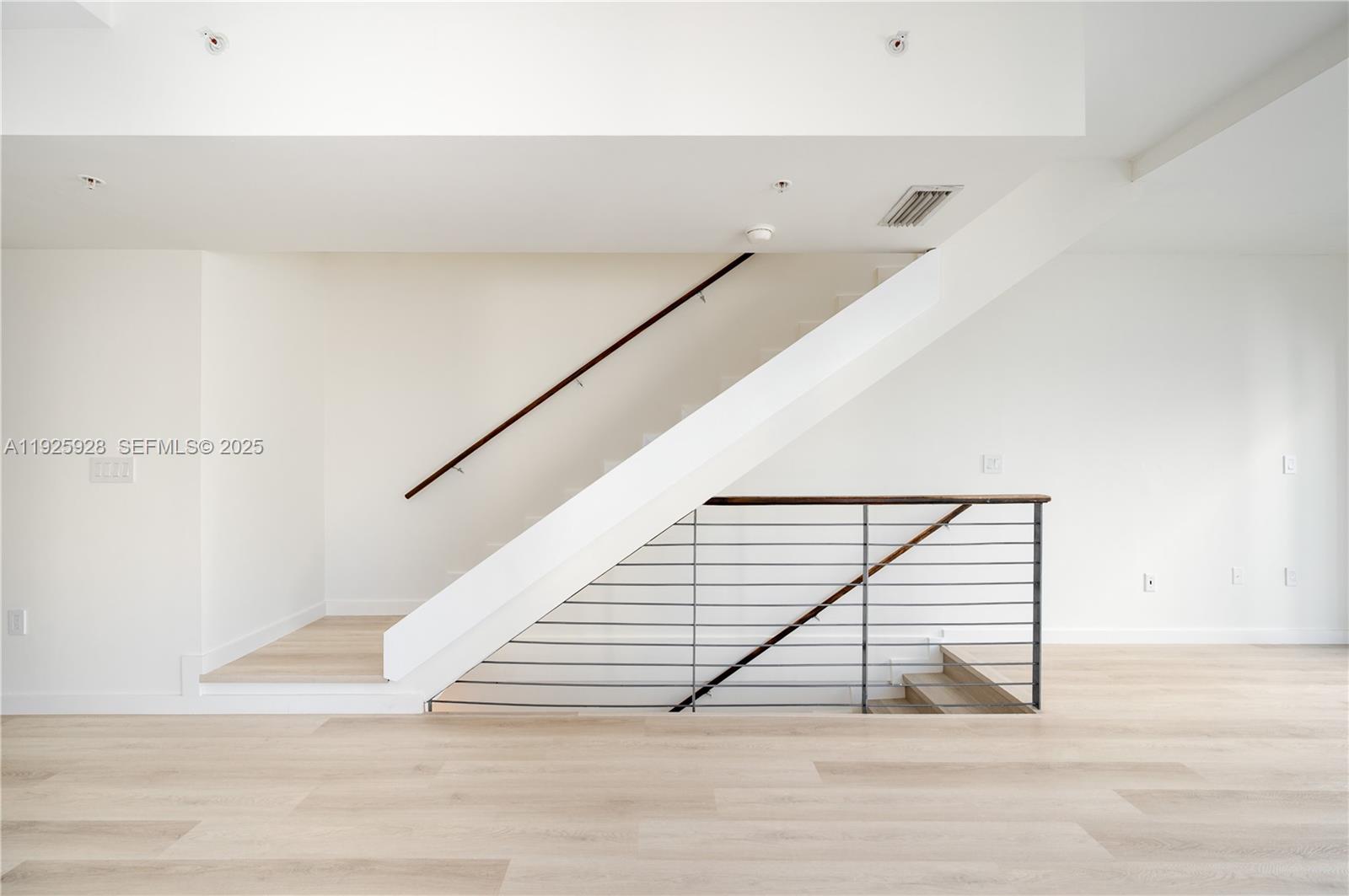 1712 Southwest 2nd Avenue, Unit 802 Miami, FL 33129 - Photo 29 of 30 a view of entryway room and stairs