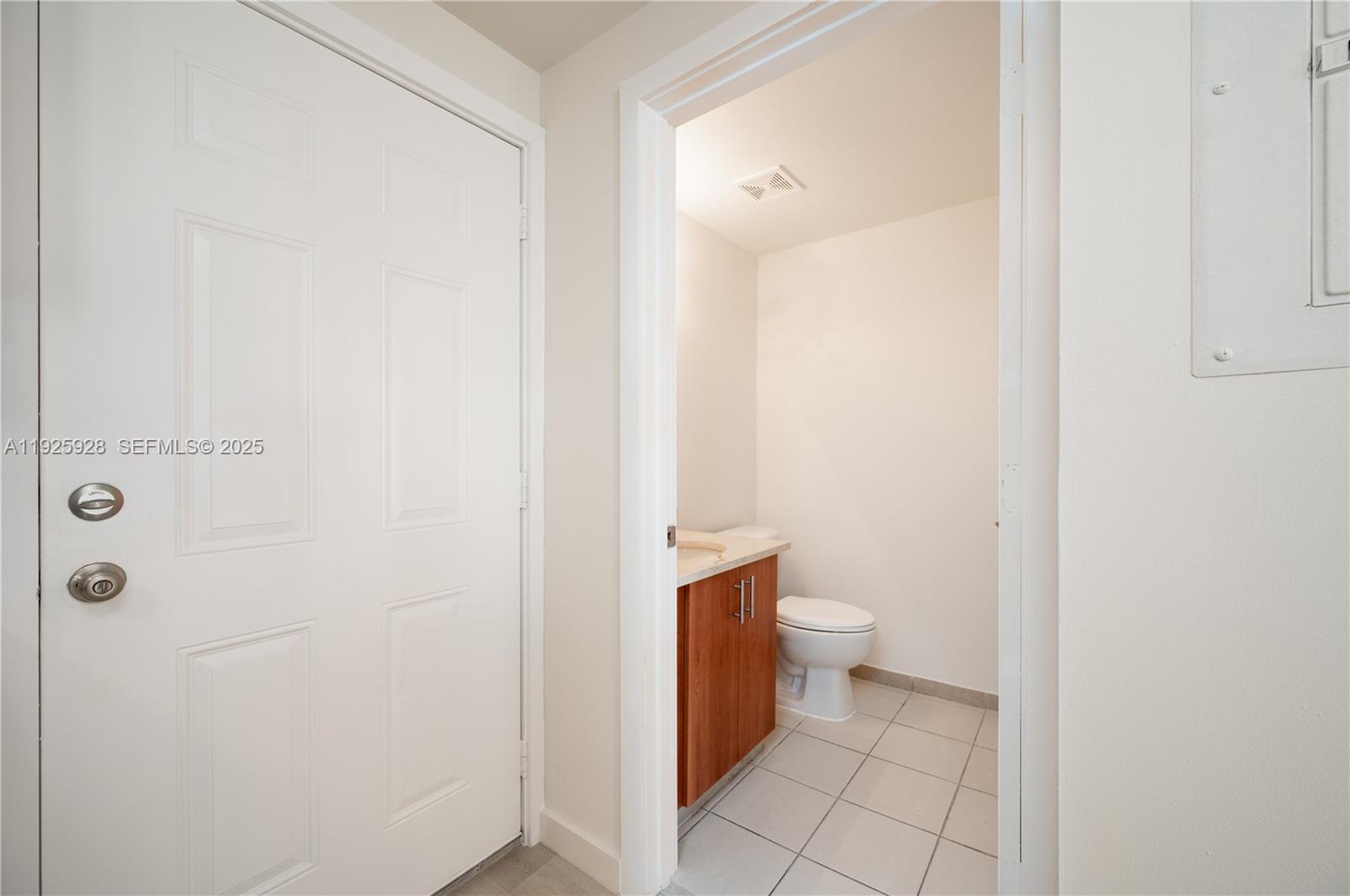 1712 Southwest 2nd Avenue, Unit 802 Miami, FL 33129 - Photo 30 of 30 a bathroom with a toilet