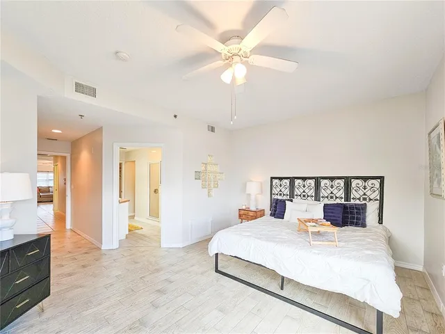 a bathroom with a tub sink and shower curtain